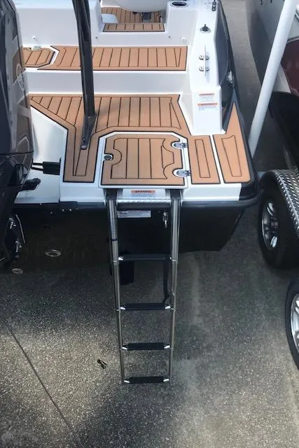 Slide: The Image of 2024 Starcraft SVX 211 boat with swim platform and ladder. - 20