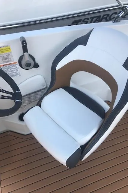 Slide: The Image of 2024 Starcraft SVX 211 boat captain's chair with modern design and comfortable seating. - 7