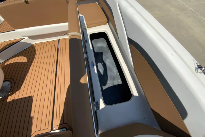 Slide: The Image of 2024 Starcraft SVX 211 boat interior storage compartment. - 11