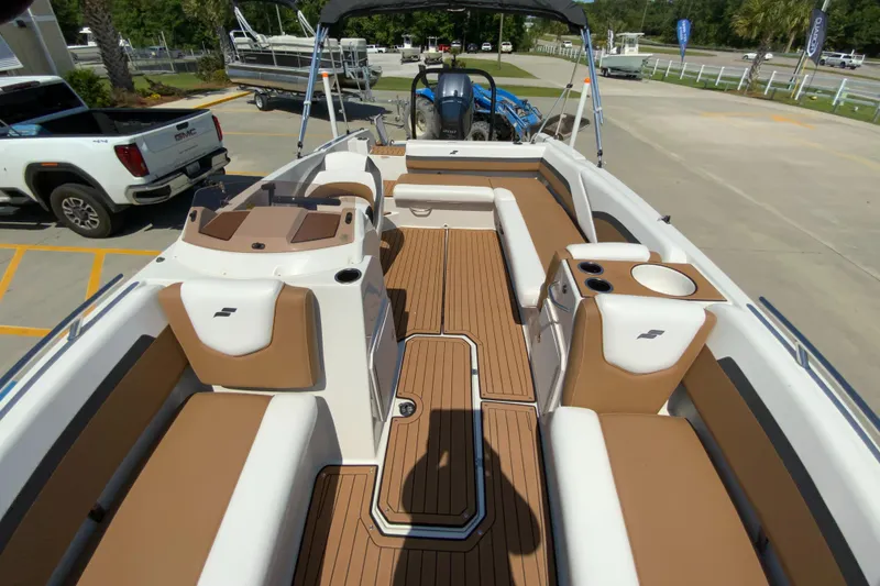 Slide: The Image of 2024 Starcraft SVX 211 boat interior with tan and white seating. - 6