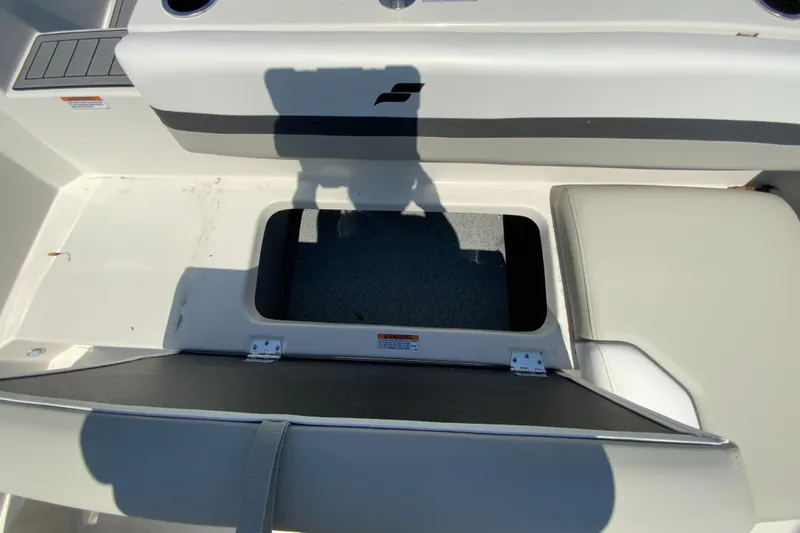Slide: The Image of 2024 Starcraft SVX 191 boat storage compartment with open hatch. - 16