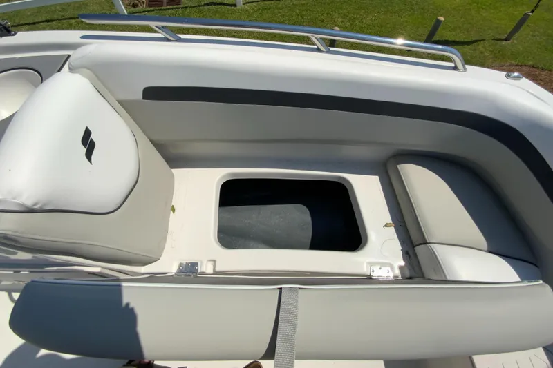 Slide: The Image of 2024 Starcraft SVX 191 boat interior seating with storage compartment. - 23