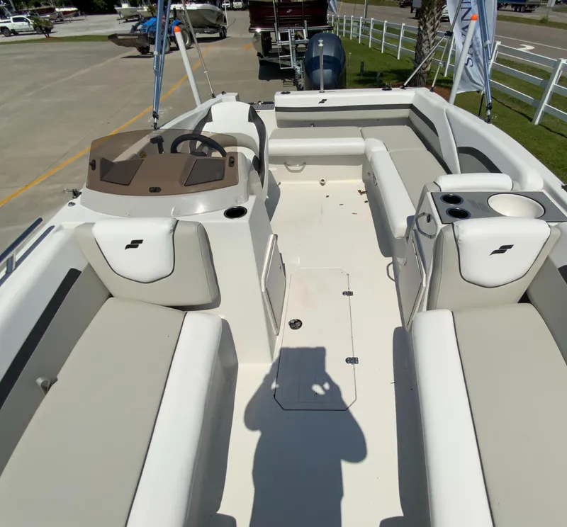 Slide: The Image of 2024 Starcraft SVX 191 boat interior with seating and steering console. - 8
