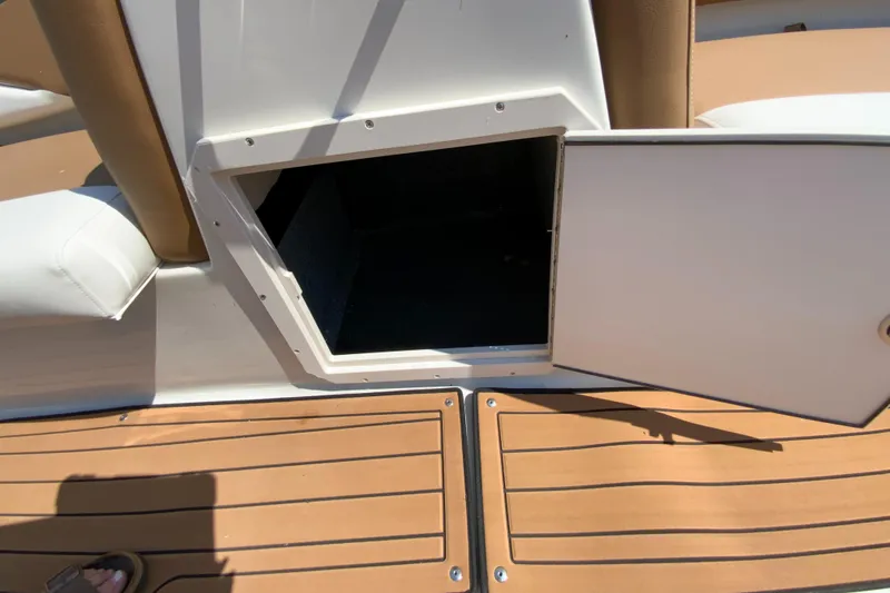 Slide: The Image of 2024 Starcraft SVX 191 boat storage compartment with open hatch. - 15