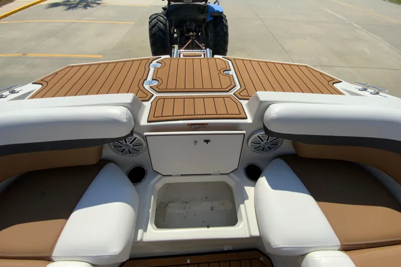 Slide: The Image of 2024 Starcraft SVX 191 boat interior with cushioned seating and storage compartments. - 19
