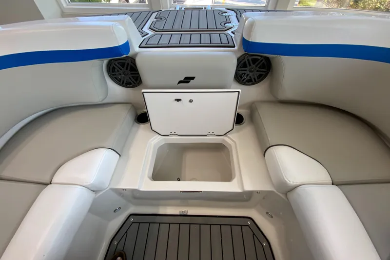 Slide: The Image of 2024 Starcraft SVX 231 boat interior with seating and storage compartments. - 20