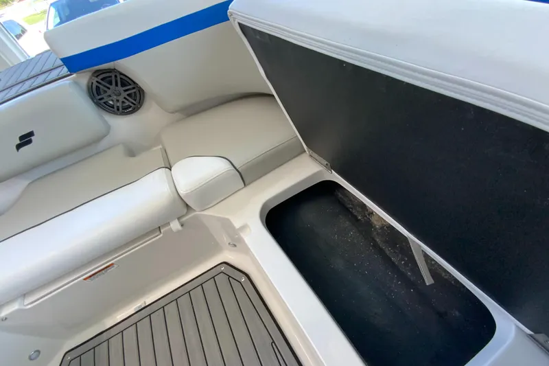 Slide: The Image of 2024 Starcraft SVX 231 boat interior with storage compartment and seating. - 22