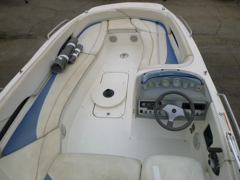 Slide: The Image of 2007 Bayliner 197 Deck Boat interior with steering wheel and seating. - 7