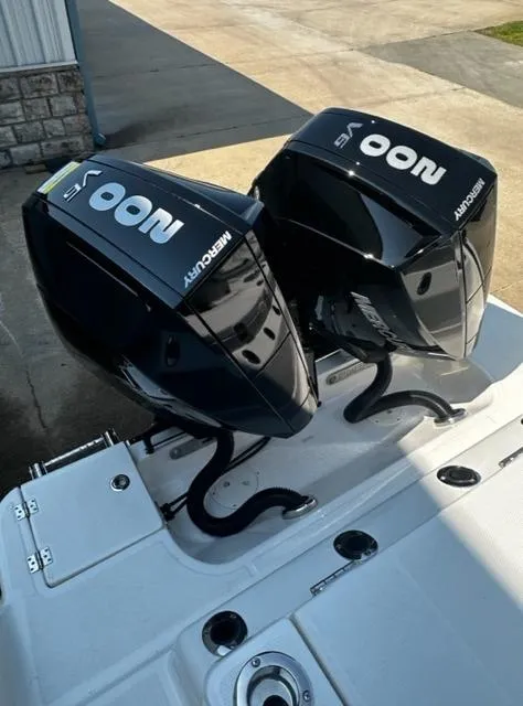 Slide: The Image of 2023 Robalo R270 boat with twin Mercury outboard engines. - 12