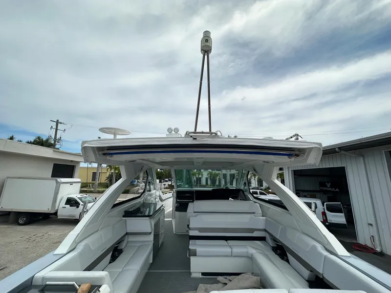 Slide: The Image of 2021 Formula 380 SSC boat with triple Mercury 400 engines on trailer. - 7