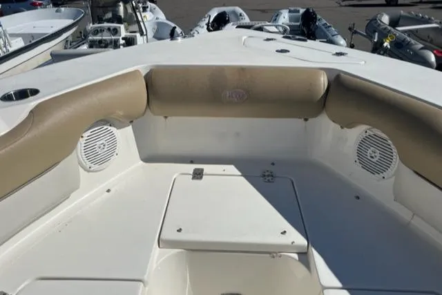 Slide: The Image of 2018 Key West 239 DFS boat interior with cushioned seating and storage compartment. - 10