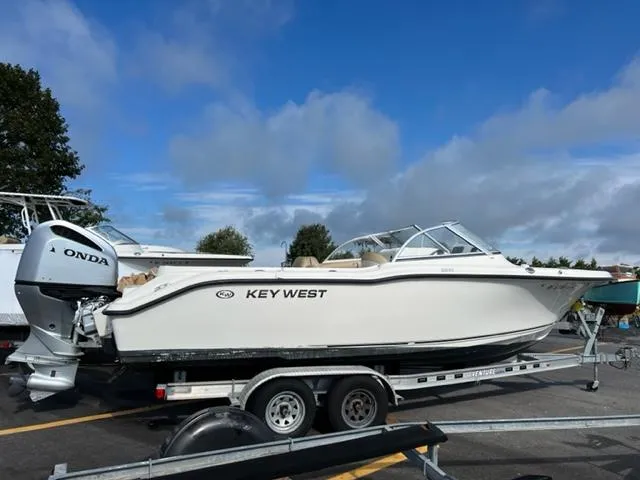 Slide: The Image of 2018 Key West 239 DFS boat on a trailer with Honda outboard motor. - 3