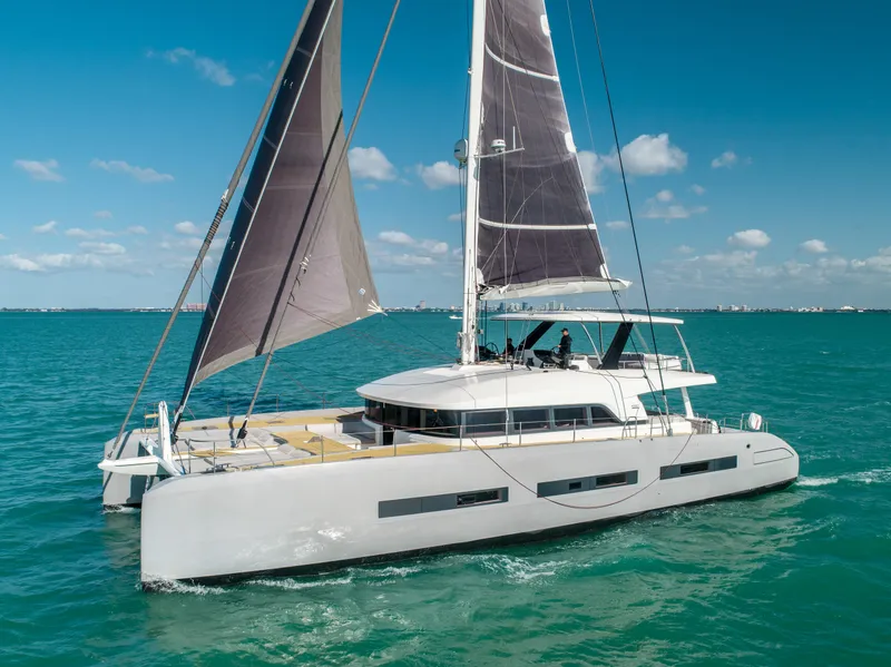 Slide: The Image of Luxury Lagoon SEVENTY 7 catamaran sailing on turquoise waters, 2020 model. - 26