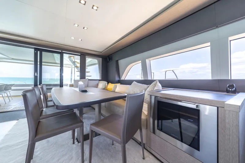 Slide: The Image of Luxurious interior of 2020 Lagoon SEVENTY 7 yacht with dining area and ocean view. - 36