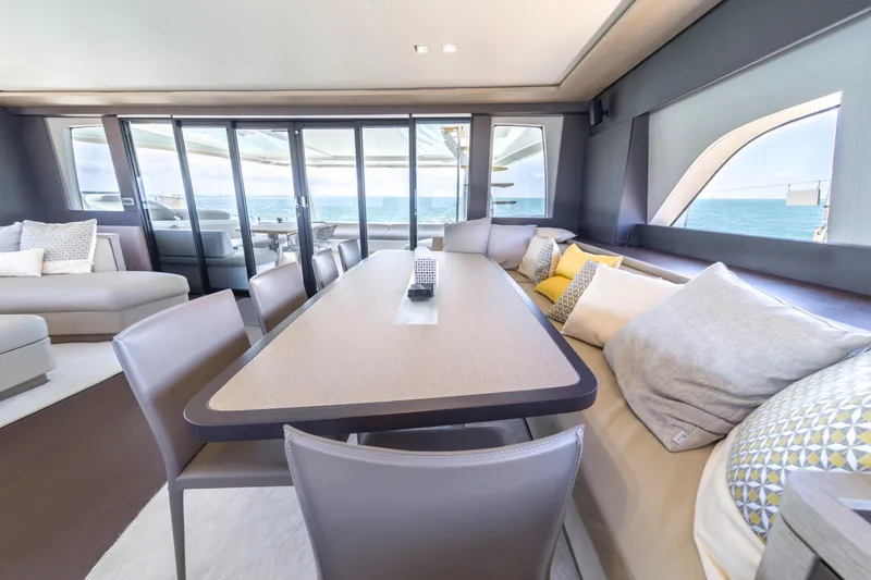 Slide: The Image of Luxurious interior of 2020 Lagoon SEVENTY 7 yacht with elegant dining area and ocean view. - 37