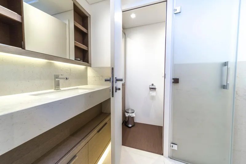 Slide: The Image of Modern bathroom interior on 2020 Lagoon SEVENTY 7 yacht, featuring sleek design and fixtures. - 48