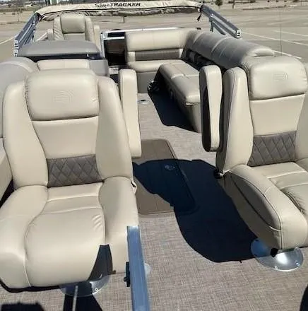 Slide: The Image of 2023 Sun Tracker Sportfish 24 XP3 boat interior with beige seating. - 3
