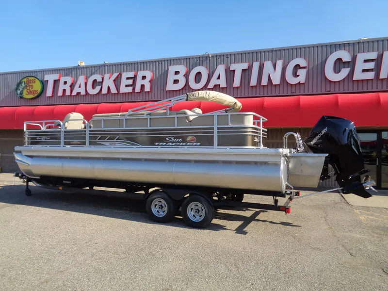 Slide: The Image of 2023 Sun Tracker Sportfish 24 XP3 pontoon boat at Tracker Boating Center. - 2