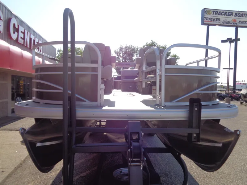 Slide: The Image of 2023 Sun Tracker Sportfish 24 XP3 pontoon boat at dealership. - 5