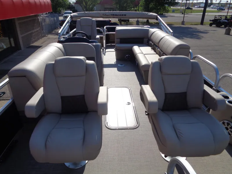 Slide: The Image of 2023 Sun Tracker Sportfish 24 XP3 pontoon boat with spacious seating and modern design. - 6