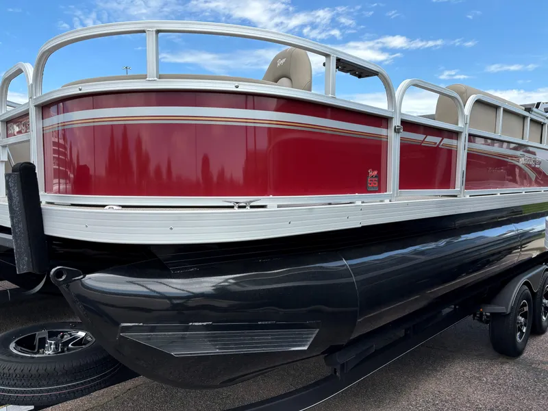 Slide: The Image of 2023 Ranger Reata 200F pontoon boat with red and white exterior. - 0