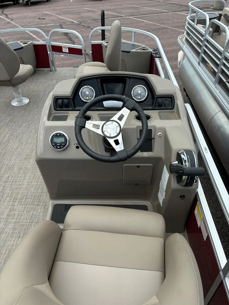 Slide: The Image of 2023 Ranger Reata 200F boat dashboard and steering wheel. - 8