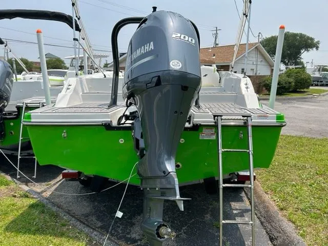 Slide: The Image of 2024 Starcraft SVX 211 Lime Green Sport boat with Yamaha 200 outboard motor. - 4