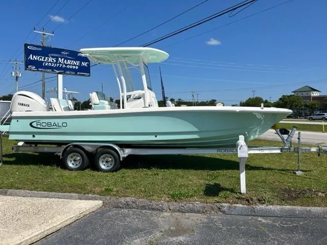 Slide: The Image of 2024 Robalo 246 Cayman boat on trailer at Anglers Marine NC. - 0