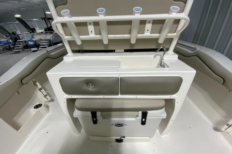 Slide: The Image of 2024 Key West 263 FS boat interior with sink and storage compartments. - 10