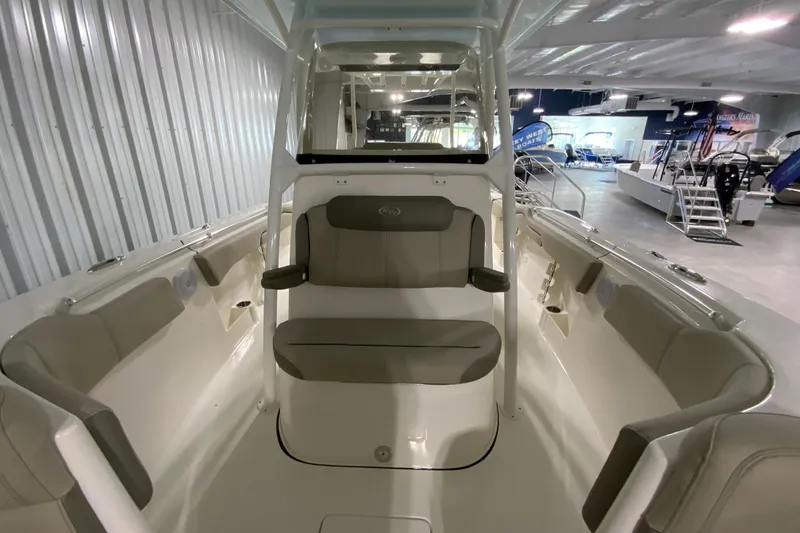 Slide: The Image of 2024 Key West 263 FS boat interior with seating and storage compartments. - 20