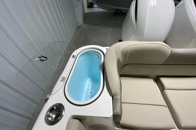 Slide: The Image of 2024 Key West 263 FS boat interior with seating and livewell. - 6