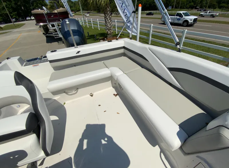 Slide: The Image of 2024 Starcraft SVX 191 boat interior with white and gray seating. - 11