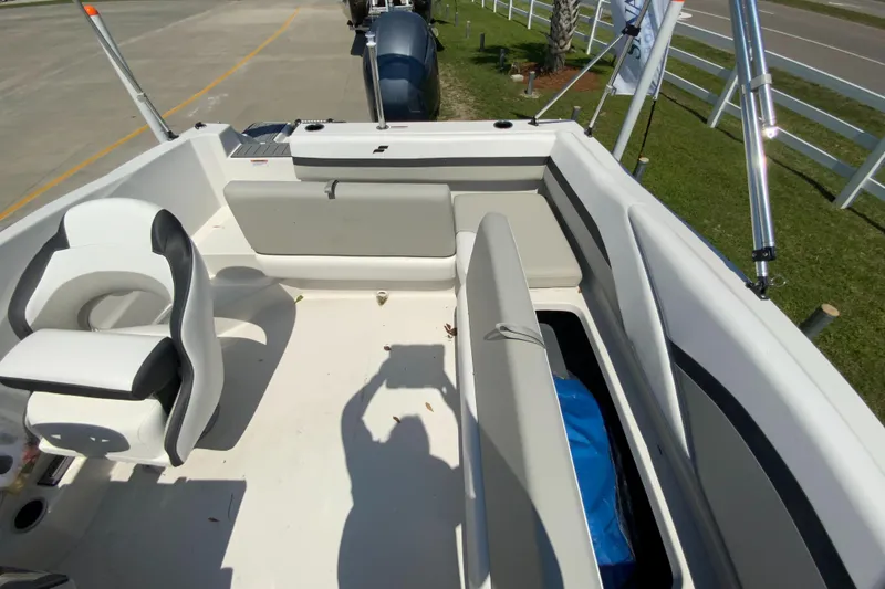 Slide: The Image of 2024 Starcraft SVX 191 boat interior with seating and storage compartments. - 13