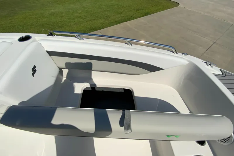 Slide: The Image of 2024 Starcraft SVX 171 boat interior with seating and storage compartment. - 18