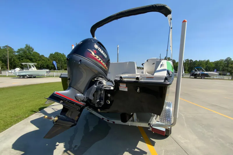 Slide: The Image of 2024 Starcraft SVX 171 boat with Yamaha outboard motor, rear view. - 6