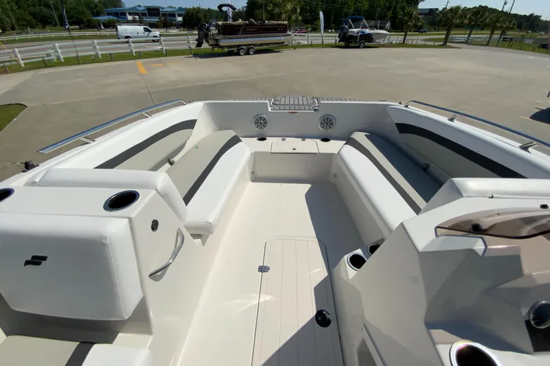 Slide: The Image of 2024 Starcraft SVX 171 boat interior with spacious seating and cup holders. - 8
