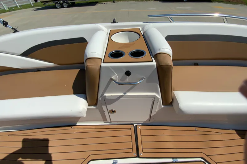 Slide: The Image of 2024 Starcraft SVX 191 boat interior with tan and white seating. - 14