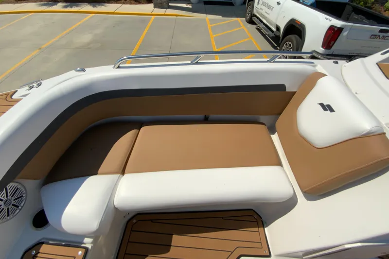 Slide: The Image of 2024 Starcraft SVX 191 boat interior with tan and white seating. - 20