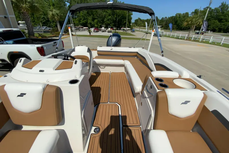 Slide: The Image of 2024 Starcraft SVX 191 boat interior with tan and white seating. - 8