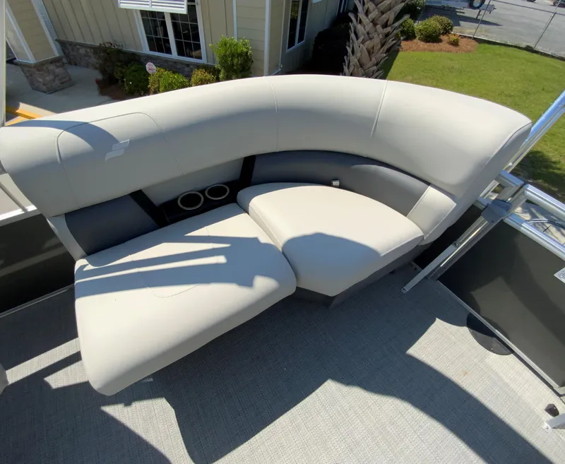 Slide: The Image of 2024 Starcraft LX20 R boat with comfortable seating and modern design. - 11