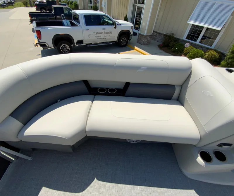 Slide: The Image of 2024 Starcraft LX20 R boat with spacious seating area. - 15