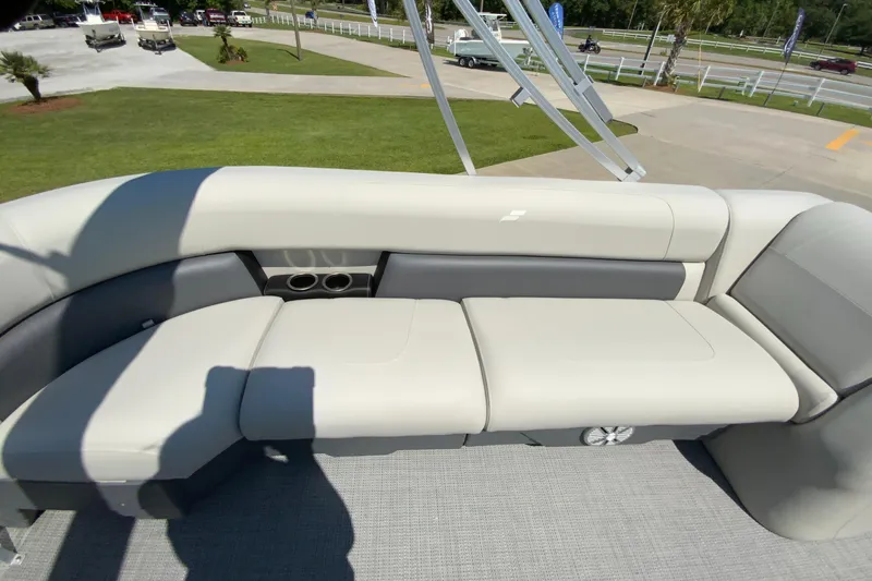 Slide: The Image of 2024 Starcraft LX20 R boat with spacious seating area and modern design. - 18