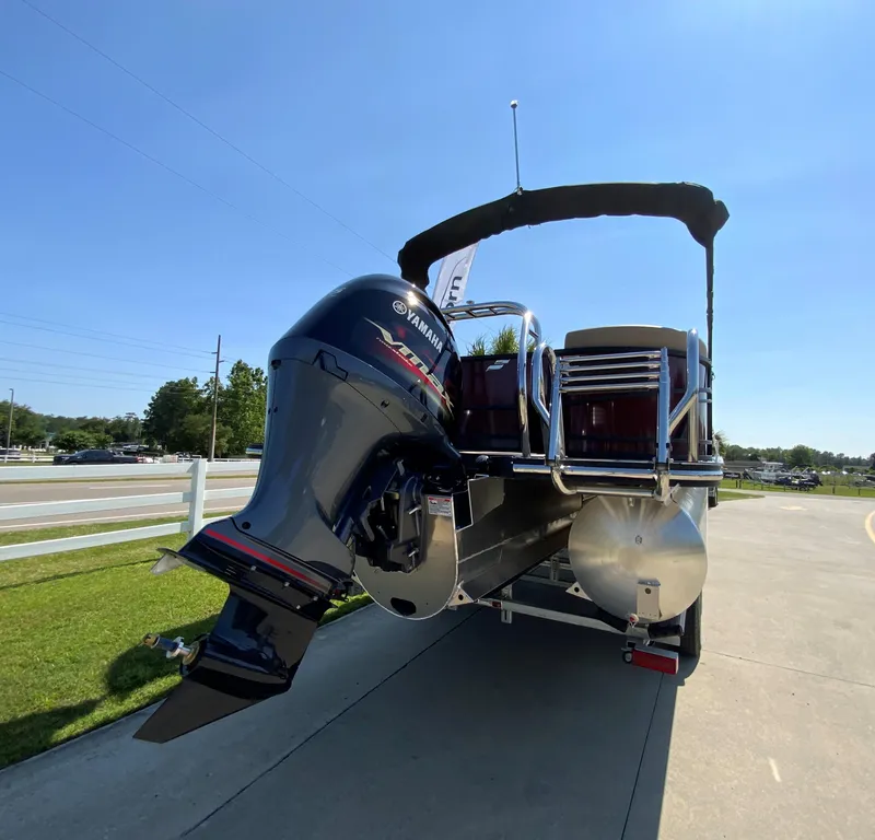 Slide: The Image of 2024 Starcraft SLS 3 pontoon boat with Yamaha outboard motor. - 3