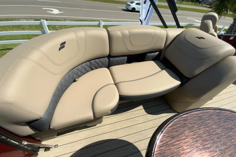 Slide: The Image of 2024 Starcraft SLS 3 boat with luxurious beige seating. - 7