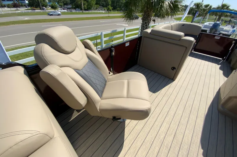 Slide: The Image of 2024 Starcraft SLS 3 boat with luxurious beige seating and spacious deck. - 11