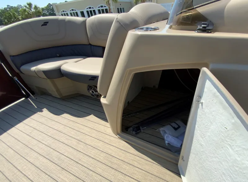 Slide: The Image of 2024 Starcraft SLS 3 boat interior with seating and storage compartment. - 12