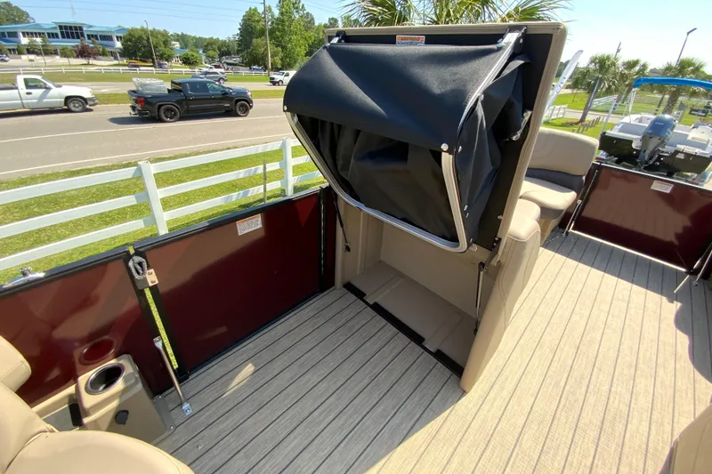 Slide: The Image of 2024 Starcraft SLS 3 boat interior with open storage compartment. - 15