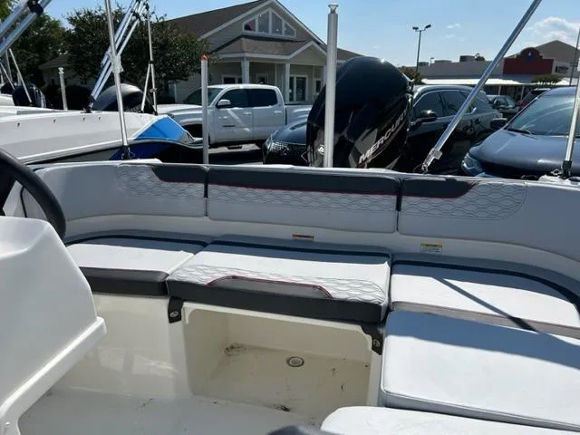 Slide: The Image of 2024 Bayliner Element M17 boat interior with seating and storage compartments. - 14