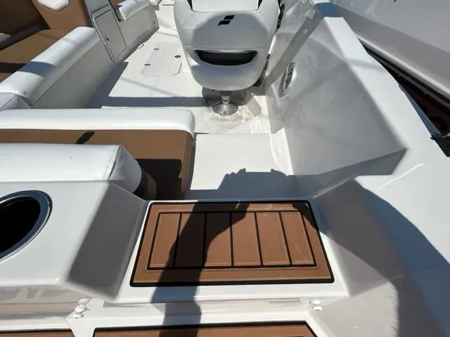 Slide: The Image of 2024 Starcraft SVX 191 boat interior with seating and helm station. - 11