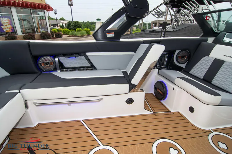 Slide: The Image of 2023 MasterCraft X24 boat interior with premium seating and modern design. - 21
